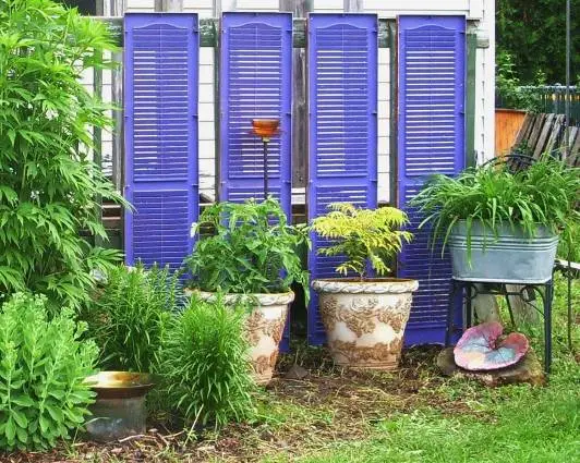 Using Shutters As Backdrops For Art And Greenery